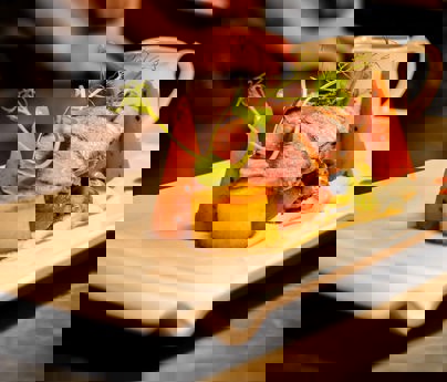 Meat and vegetables beautifully presented on a plate